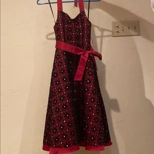 A formal dress with a velvet shrug